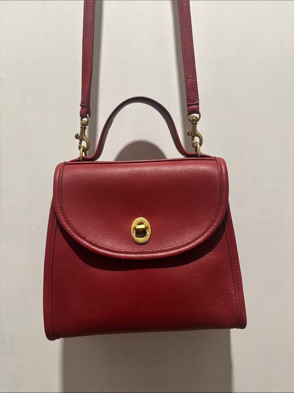COACH Regina vintage leather bag with crossbody strap and top handle red